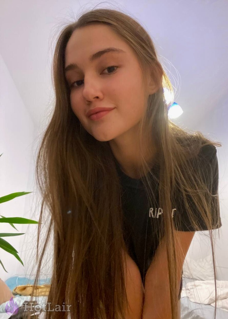 Captivating nude woman in seductive stance